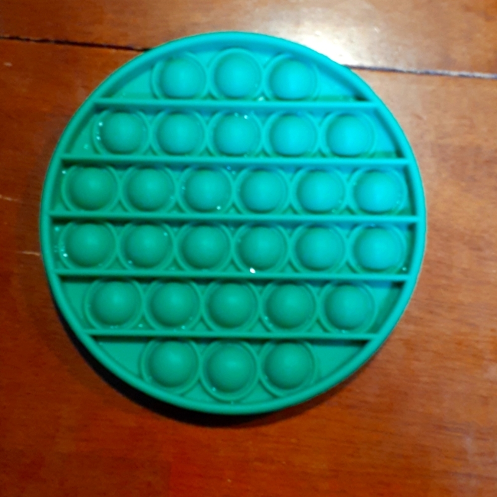 Im selling a popit, its teal,small,from five below.